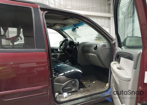 2003 GMC Envoy Sle z USA, uszkodzony, nr VIN 1GKDT13S332142920